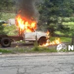 Queman camionetas de talamontes en la México Toluca 